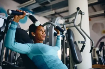 Woman exercising and keeping her ears, nose, and throat safe