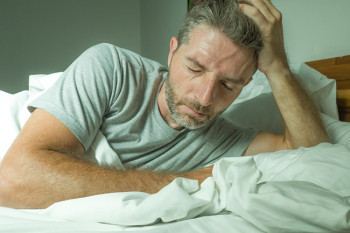 Man unable to sleep because of acid reflux